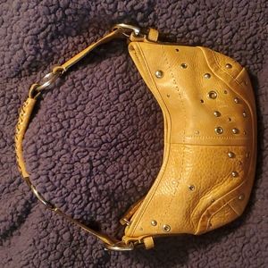 Vintage Coach leather hobo handbag.